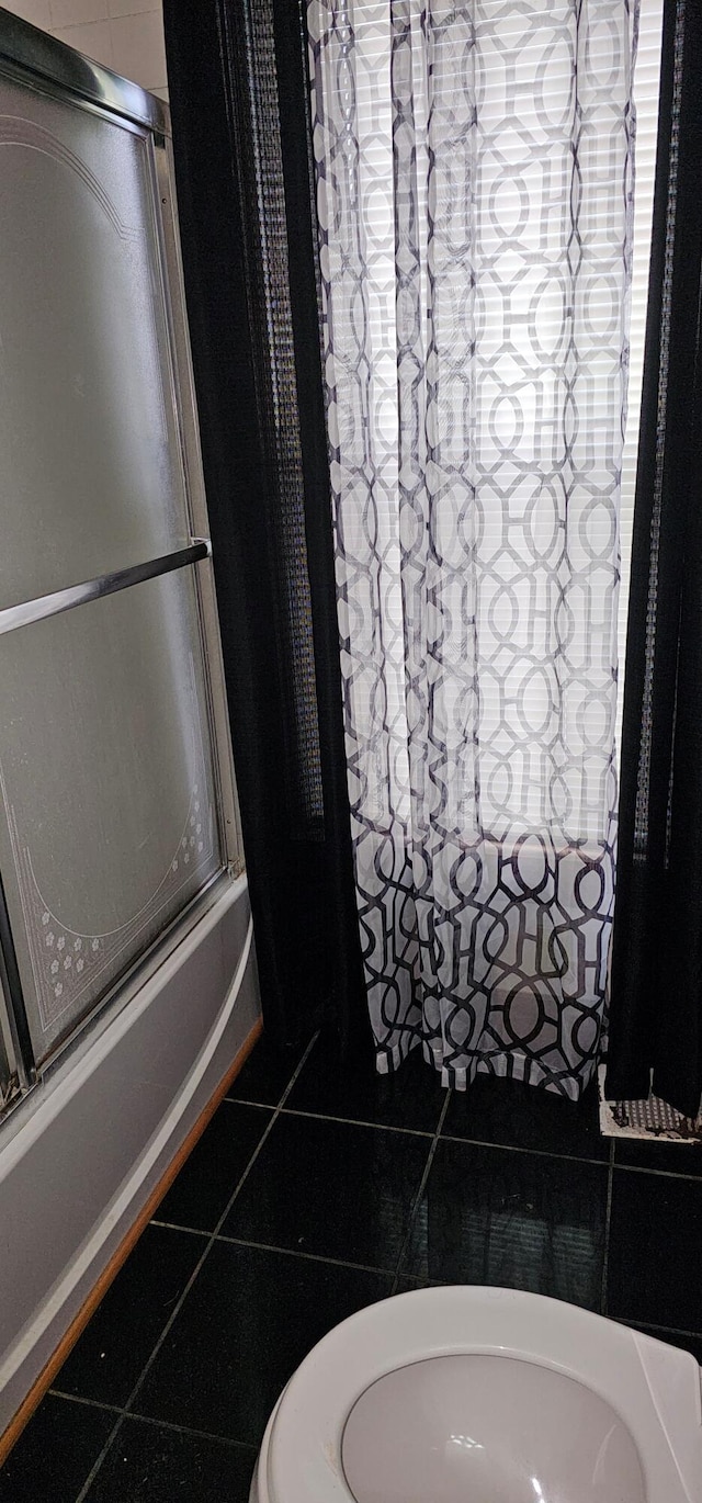 18 Pine St, Skowhegan, ME 04976 - bathroom featuring bath / shower combo with glass door and tile patterned flooring