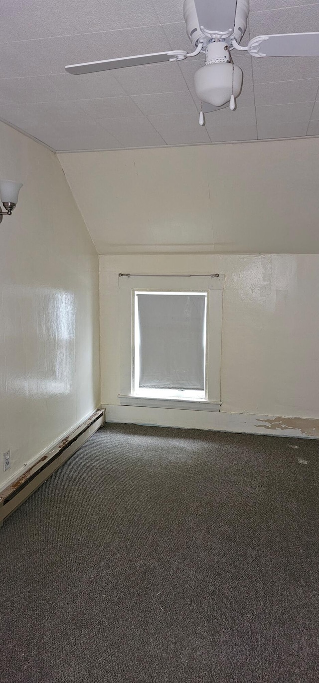 18 Pine St, Skowhegan, ME 04976 - unfurnished room featuring carpet flooring, vaulted ceiling, and a baseboard heating unit