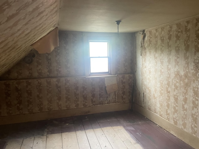 722 Farmington Rd, Strong, ME 04983 - bonus room featuring hardwood / wood-style floors and baseboards