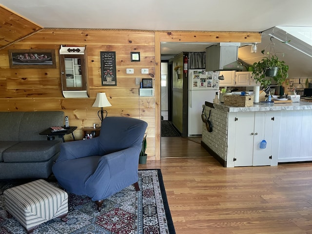 2130 Summerhaven Rd, Sidney, ME 04330 - living room with light wood-type flooring and wooden walls