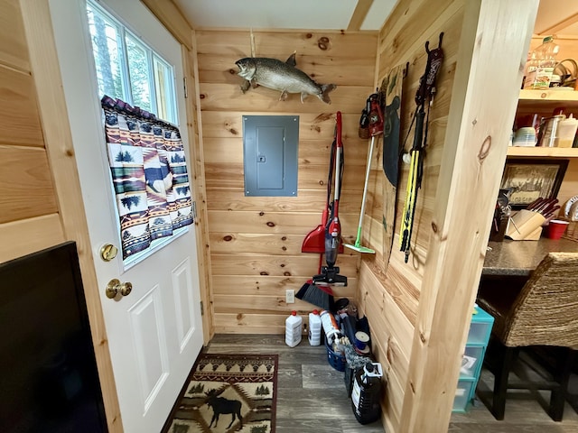 172 Blanchard Rd, Monson, ME 04464 - mudroom with electric panel, wooden walls, and wood finished floors