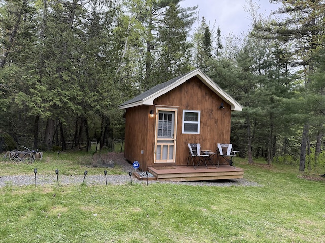 172 Blanchard Rd, Monson, ME 04464 - view of outdoor structure with a wooded view