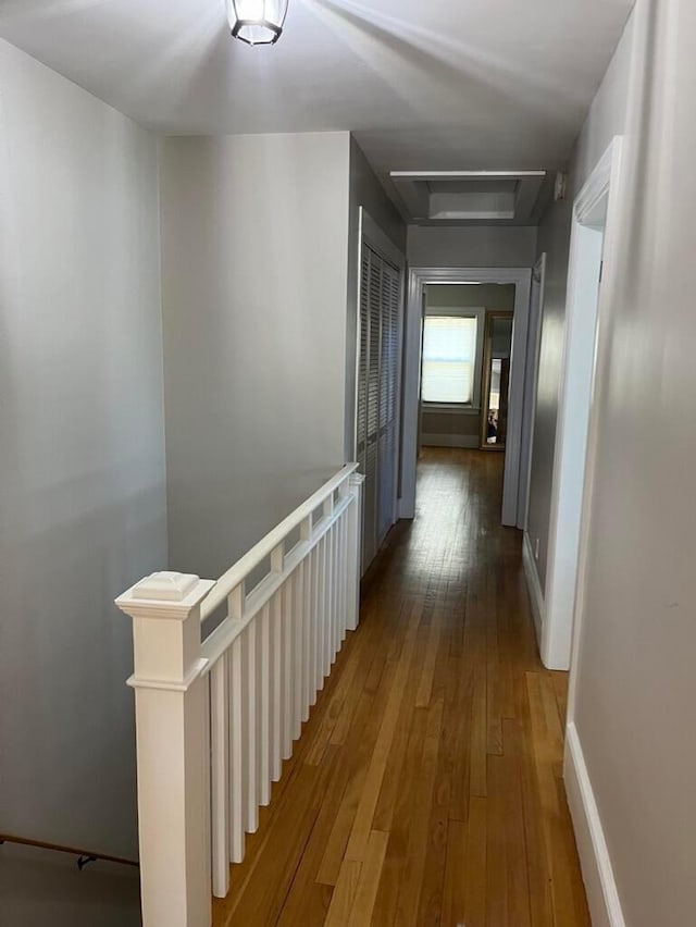 224 N St Unit 101-102, Saco, ME 04072 - hallway with an upstairs landing, attic access, hardwood / wood-style flooring, and baseboards
