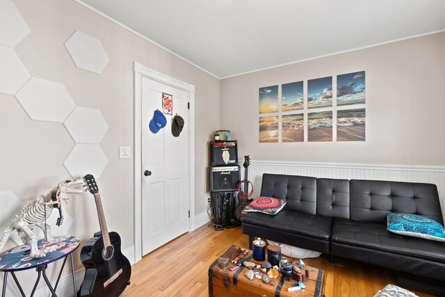 224 N St Unit 101-102, Saco, ME 04072 - living room featuring light wood finished floors and crown molding