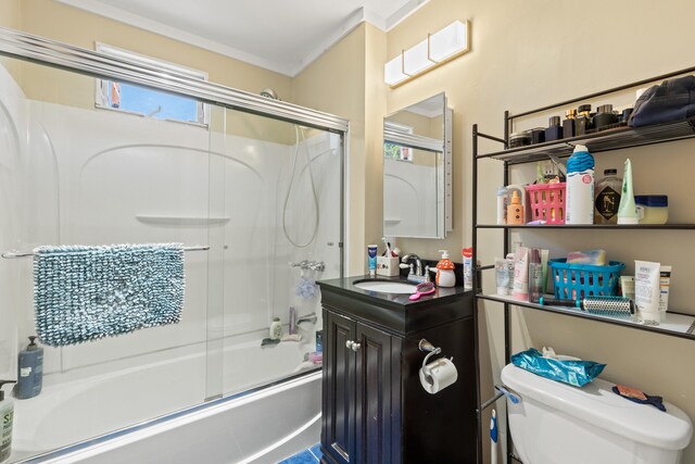 224 N St Unit 101-102, Saco, ME 04072 - full bathroom featuring enclosed tub / shower combo, toilet, vanity, and crown molding