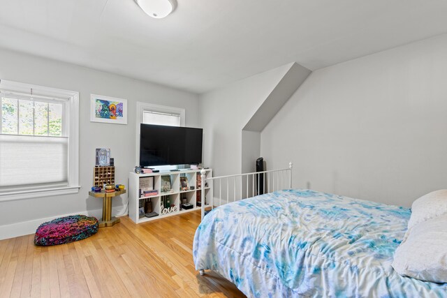 224 N St Unit 101-102, Saco, ME 04072 - bedroom with multiple windows and wood finished floors