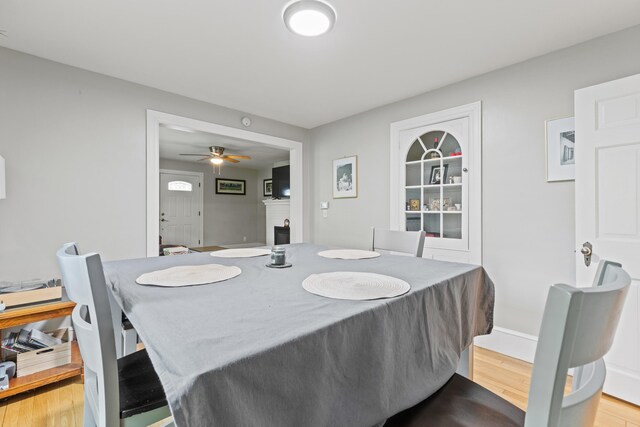 224 N St Unit 101-102, Saco, ME 04072 - dining room with wood finished floors and a ceiling fan