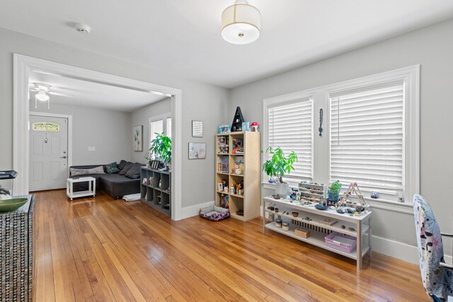 224 N St Unit 101-102, Saco, ME 04072 - living area with light wood-type flooring, baseboards, and a ceiling fan