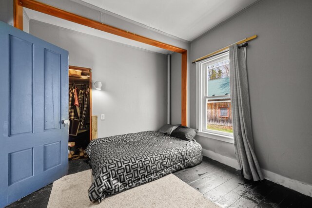 43 Whales Back Rd, Sullivan, ME 04664 - bedroom featuring a walk in closet, a closet, and baseboards