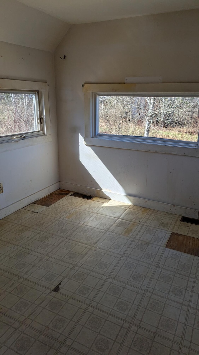 19 Lubec Rd, Whiting, ME 04691 - spare room with vaulted ceiling and baseboards