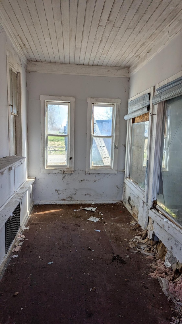 19 Lubec Rd, Whiting, ME 04691 - spare room with plenty of natural light, wood ceiling, and crown molding