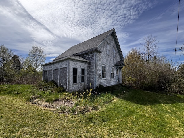 19 Lubec Rd, Whiting, ME 04691 - view of side of home with a lawn