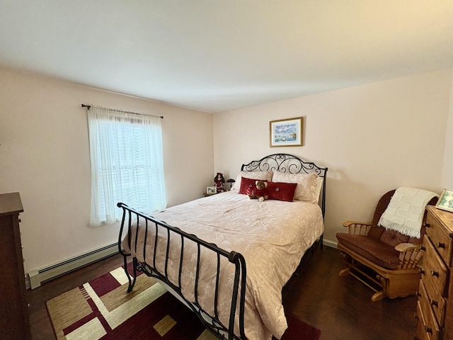 16 Caron Dr, Howland, ME 04448 - bedroom featuring a baseboard radiator and wood finished floors