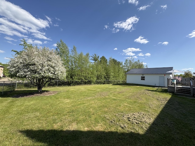 16 Caron Dr, Howland, ME 04448 - view of yard with a deck