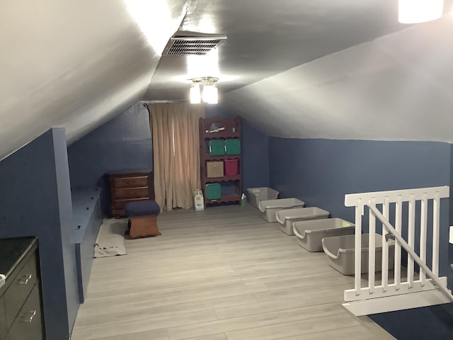 15 Blaine St, Fort Fairfield, ME 04742 - additional living space with wood finished floors and vaulted ceiling