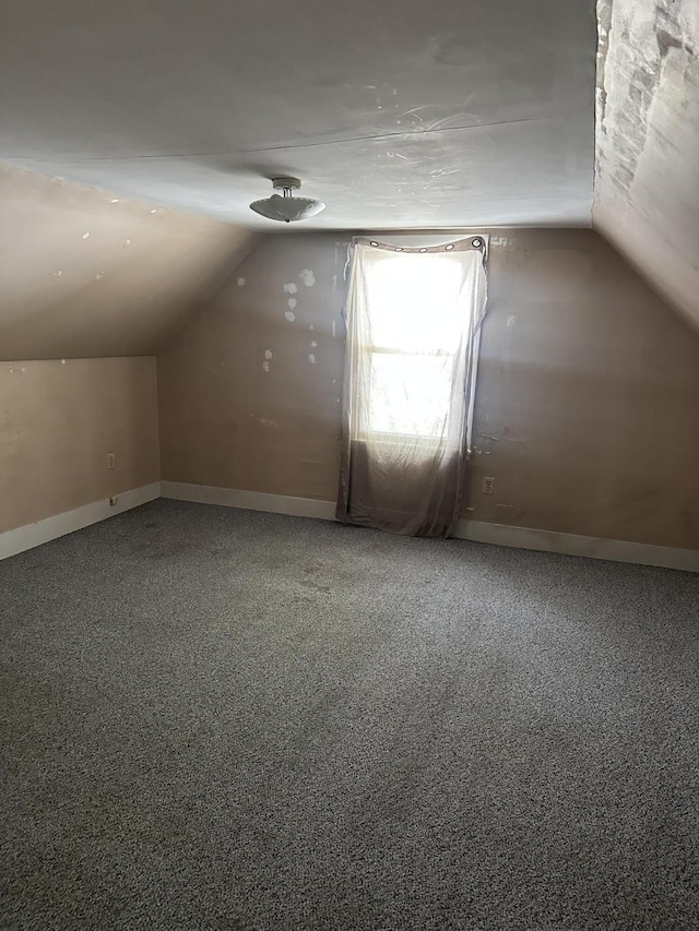 163 Court St, Bangor, ME 04401 - bonus room with vaulted ceiling, carpet floors, and baseboards