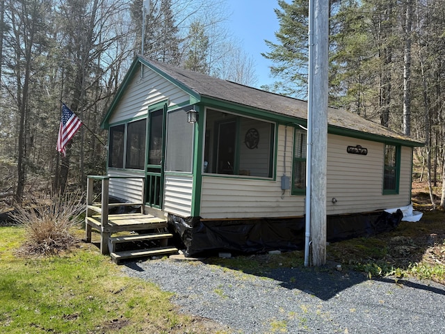 15 Wilson Pond Rd (Hedgehog), Unit Hedgehog Greenville, ME 04441 - view of home's exterior featuring a sunroom