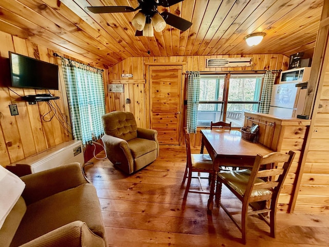 15 Wilson Pond Rd (Hedgehog), Unit Hedgehog Greenville, ME 04441 - dining space featuring wood ceiling, wood-type flooring, wooden walls, a ceiling fan, and vaulted ceiling