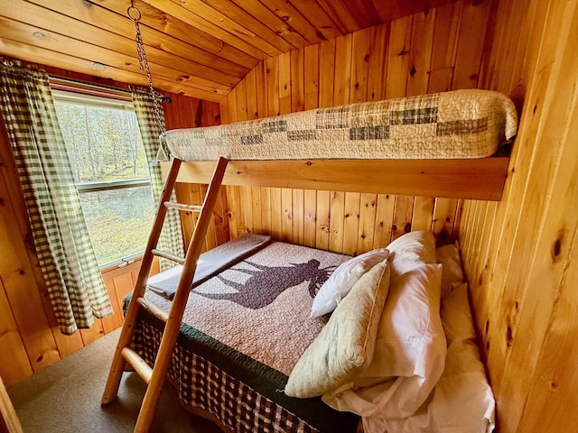 15 Wilson Pond Rd (Hedgehog), Unit Hedgehog Greenville, ME 04441 - carpeted bedroom featuring wood walls and lofted ceiling