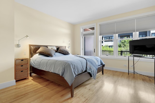 48 Federal St Unit B, Portland, ME 04101 - bedroom with light wood-type flooring and baseboards