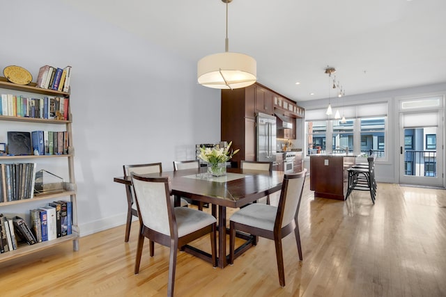 48 Federal St Unit B, Portland, ME 04101 - dining area featuring light wood finished floors, baseboards, and recessed lighting