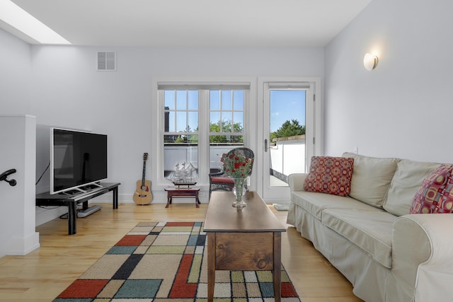 48 Federal St Unit B, Portland, ME 04101 - living room with light wood-style floors and baseboards