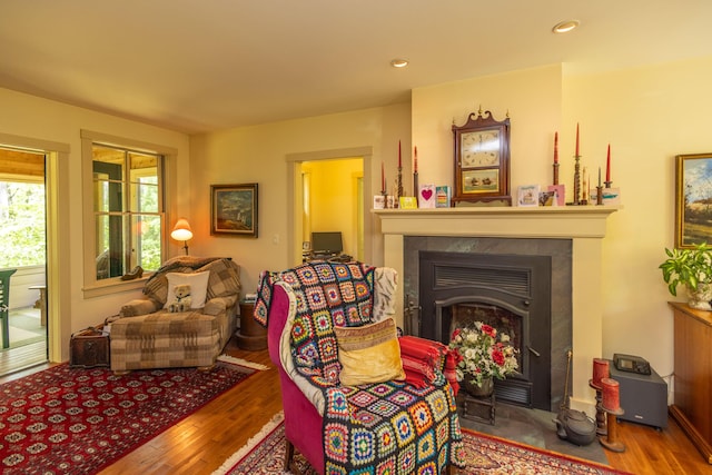 337 Washington St, Camden, ME 04843 - sitting room featuring wood finished floors, a fireplace with flush hearth, and recessed lighting