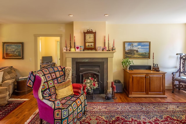 337 Washington St, Camden, ME 04843 - living room with wood finished floors, a fireplace with flush hearth, and recessed lighting