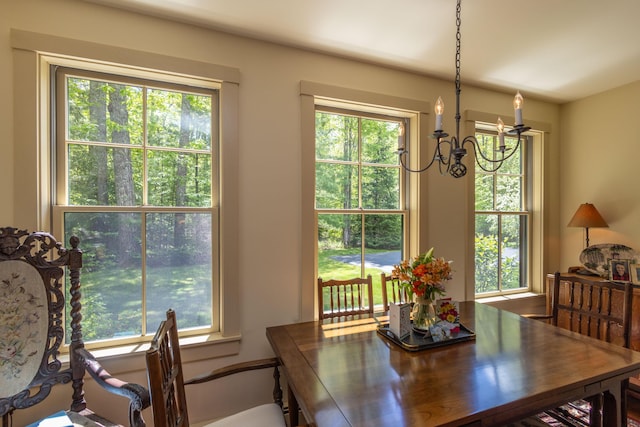 337 Washington St, Camden, ME 04843 - dining area with a chandelier and healthy amount of natural light