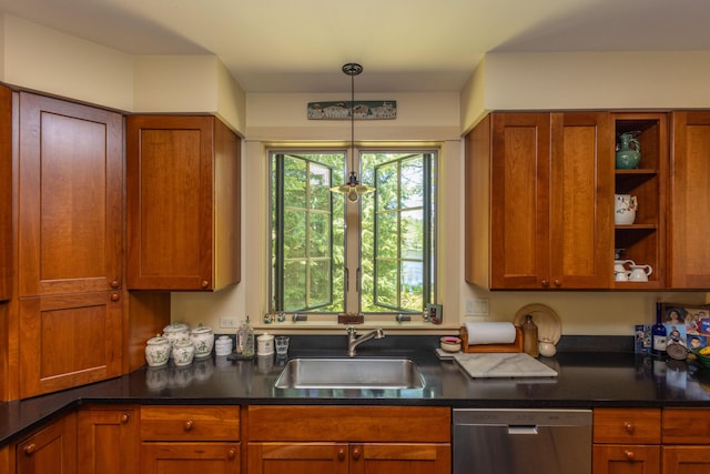 337 Washington St, Camden, ME 04843 - kitchen featuring a sink, dishwasher, dark countertops, brown cabinetry, and hanging light fixtures