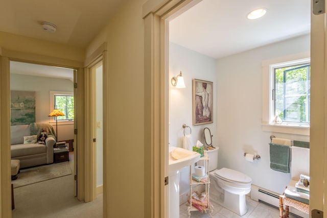 337 Washington St, Camden, ME 04843 - bathroom featuring a baseboard heating unit, plenty of natural light, and toilet
