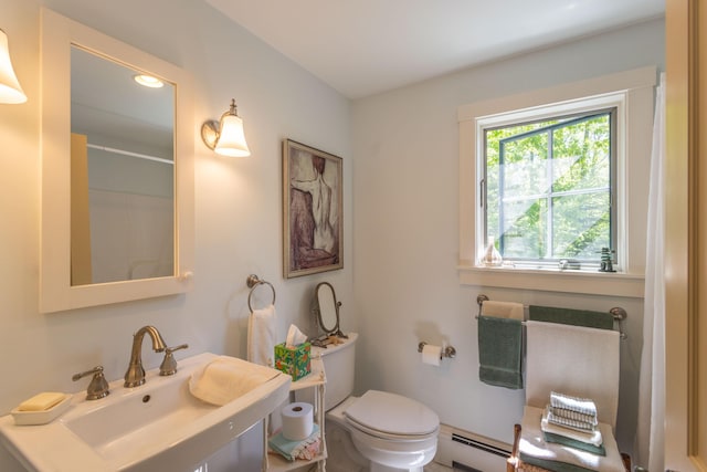 337 Washington St, Camden, ME 04843 - full bathroom with toilet, a sink, a baseboard radiator, and a shower