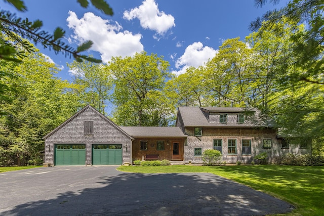 337 Washington St, Camden, ME 04843 - shingle-style home featuring asphalt driveway, a garage, and a front yard