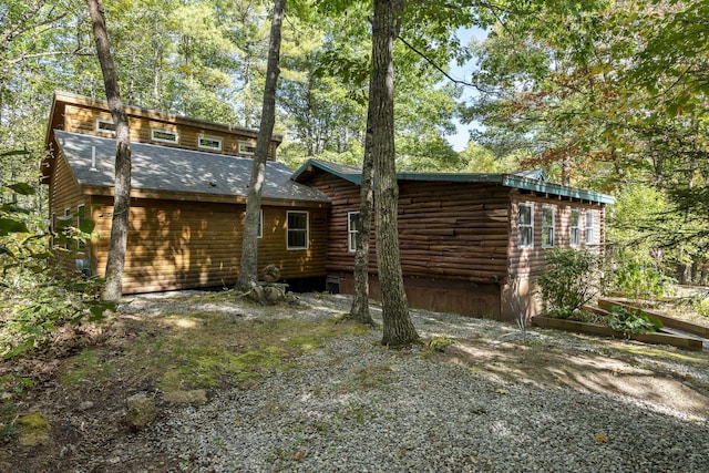 17 Spruce Meadow Ln, Jefferson, ME 04348 - rear view of house featuring roof with shingles