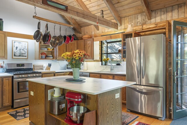 17 Spruce Meadow Ln, Jefferson, ME 04348 - kitchen featuring stainless steel appliances, open shelves, wooden ceiling, a sink, and brown cabinets
