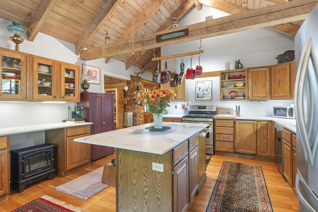 17 Spruce Meadow Ln, Jefferson, ME 04348 - kitchen featuring appliances with stainless steel finishes, wooden ceiling, a center island, light wood finished floors, and open shelves