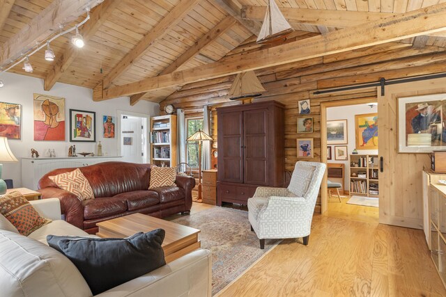 17 Spruce Meadow Ln, Jefferson, ME 04348 - living area featuring wooden ceiling, light wood-style floors, track lighting, and a barn door