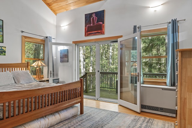 17 Spruce Meadow Ln, Jefferson, ME 04348 - bedroom with access to exterior, multiple windows, vaulted ceiling, wood ceiling, and wood finished floors