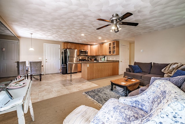 175 Lake House Rd, Naples, ME 04055 - living room featuring ceiling fan, recessed lighting, and light tile patterned flooring