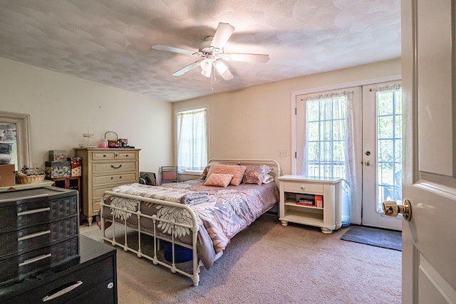 175 Lake House Rd, Naples, ME 04055 - carpeted bedroom featuring access to outside and ceiling fan