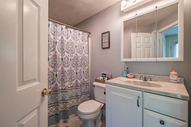 175 Lake House Rd, Naples, ME 04055 - full bath with toilet, vanity, tile patterned flooring, and a shower with shower curtain