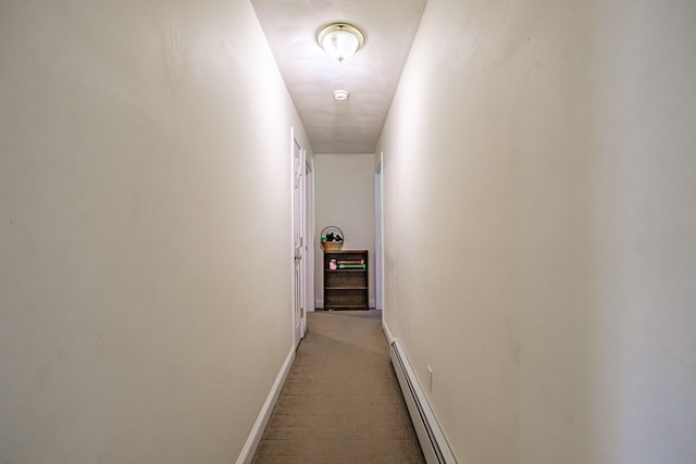 175 Lake House Rd, Naples, ME 04055 - corridor with baseboard heating, light colored carpet, and baseboards