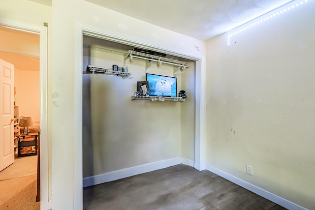 175 Lake House Rd, Naples, ME 04055 - hallway featuring baseboards and concrete flooring