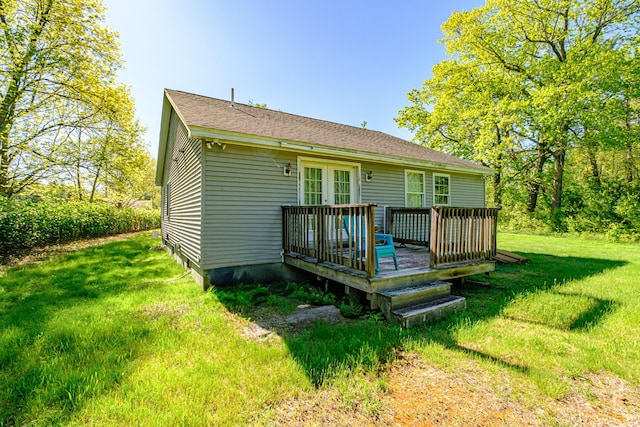 175 Lake House Rd, Naples, ME 04055 - rear view of property featuring a wooden deck and a lawn