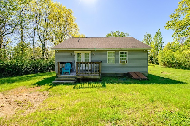 175 Lake House Rd, Naples, ME 04055 - rear view of property with a wooden deck and a lawn