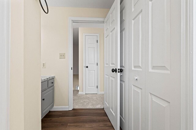 162 Beach St Unit 4, Saco, ME 04072 - hall featuring baseboards, dark wood-style flooring, and dark colored carpet