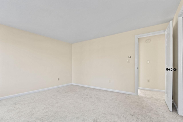 162 Beach St Unit 4, Saco, ME 04072 - unfurnished room featuring light colored carpet, baseboards, and a smoke detector