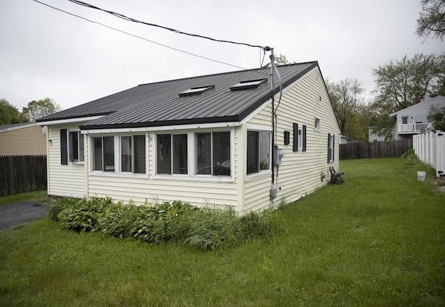 15 Lucille St, Saco, ME 04072 - view of property exterior with metal roof