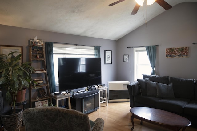 15 Lucille St, Saco, ME 04072 - living room featuring ceiling fan, lofted ceiling, plenty of natural light, and wood finished floors