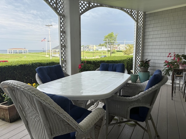 31 Ocean Ave Unit 105, York, ME 03909 - wooden terrace featuring a lawn and outdoor dining area